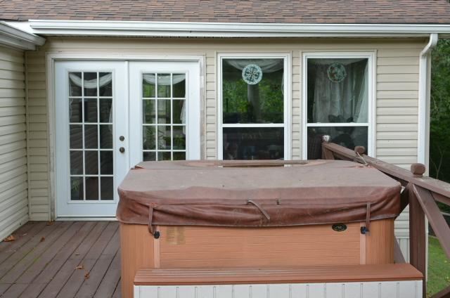 Hot tub on large attached deck
