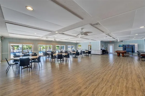a view of a dining room with hardwood floor