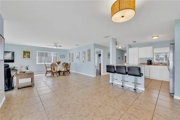 a view of a livingroom with furniture and white walls