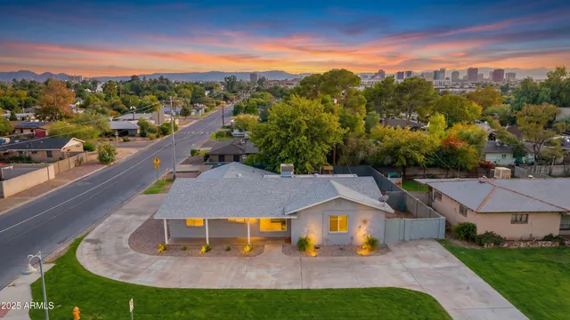 a view of a house with a yard