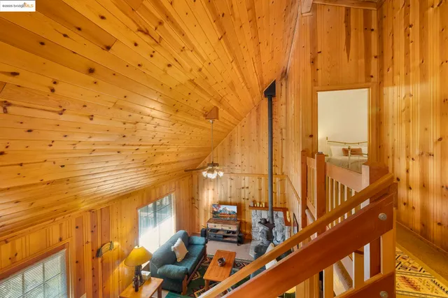 a bedroom with a bed and a table with chair