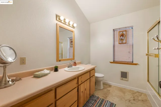 a view of a deck with chairs and wooden floor