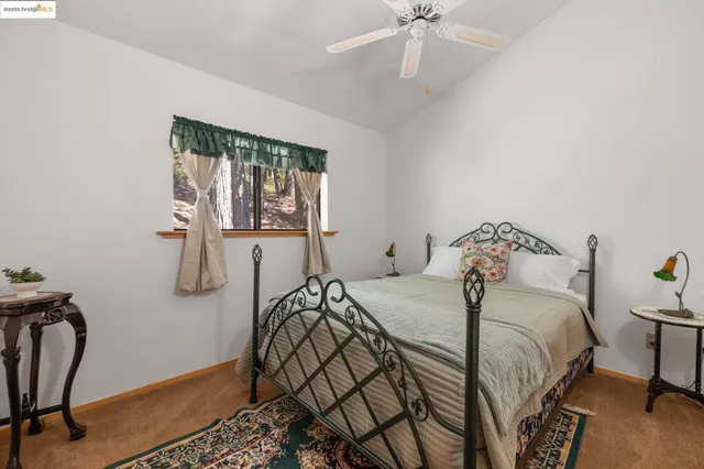 a view of patio with table and chairs and wooden floor