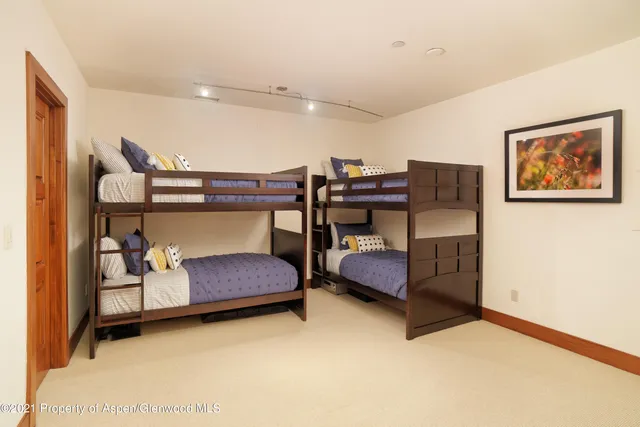 a bedroom with furniture and window