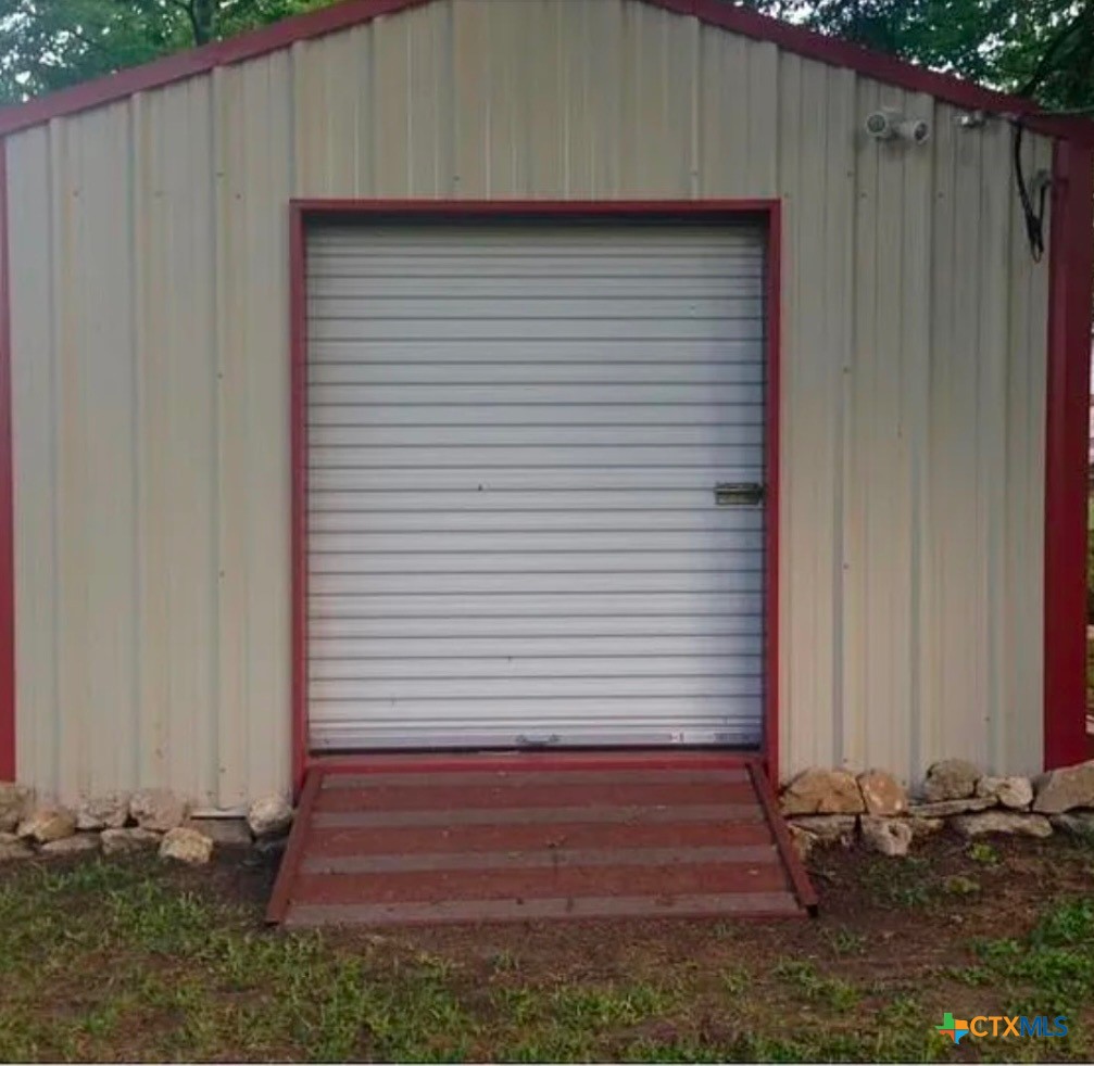 2418 Osage Road Gatesville, TX 76528 - Photo 15 of 15 a view of a house with a backyard