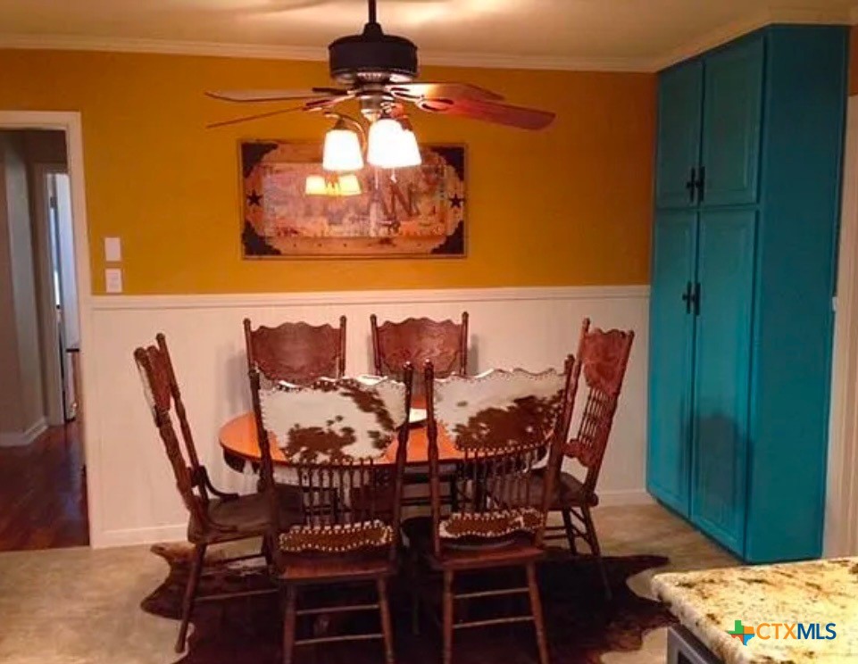 2418 Osage Road Gatesville, TX 76528 - Photo 4 of 15 a view of a dining room with furniture and wooden floor