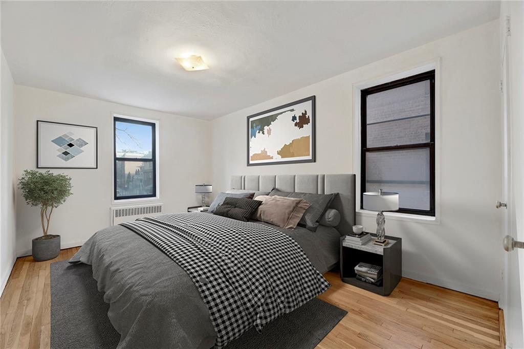 9902 3rd Avenue, Unit 1M Brooklyn, NY 11209 - Photo 5 of 20 a bedroom with bed and window