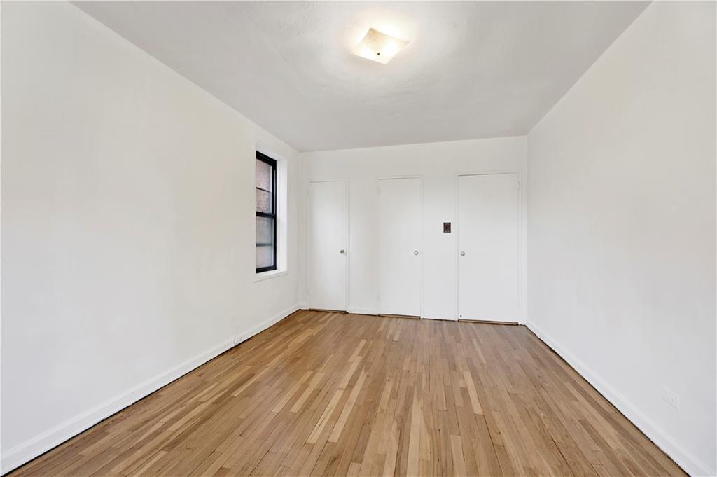 9902 3rd Avenue, Unit 1M Brooklyn, NY 11209 - Photo 10 of 20 wooden floor in a room