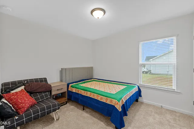 a room with furniture and a window