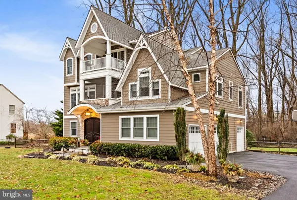 a front view of a house with swimming pool