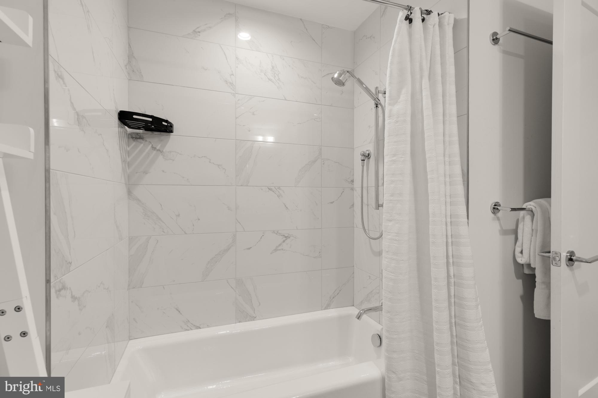 45 Sutton Square Southwest, Unit 303 Washington, DC 20024 - Photo 35 of 60 With tub and shower combination