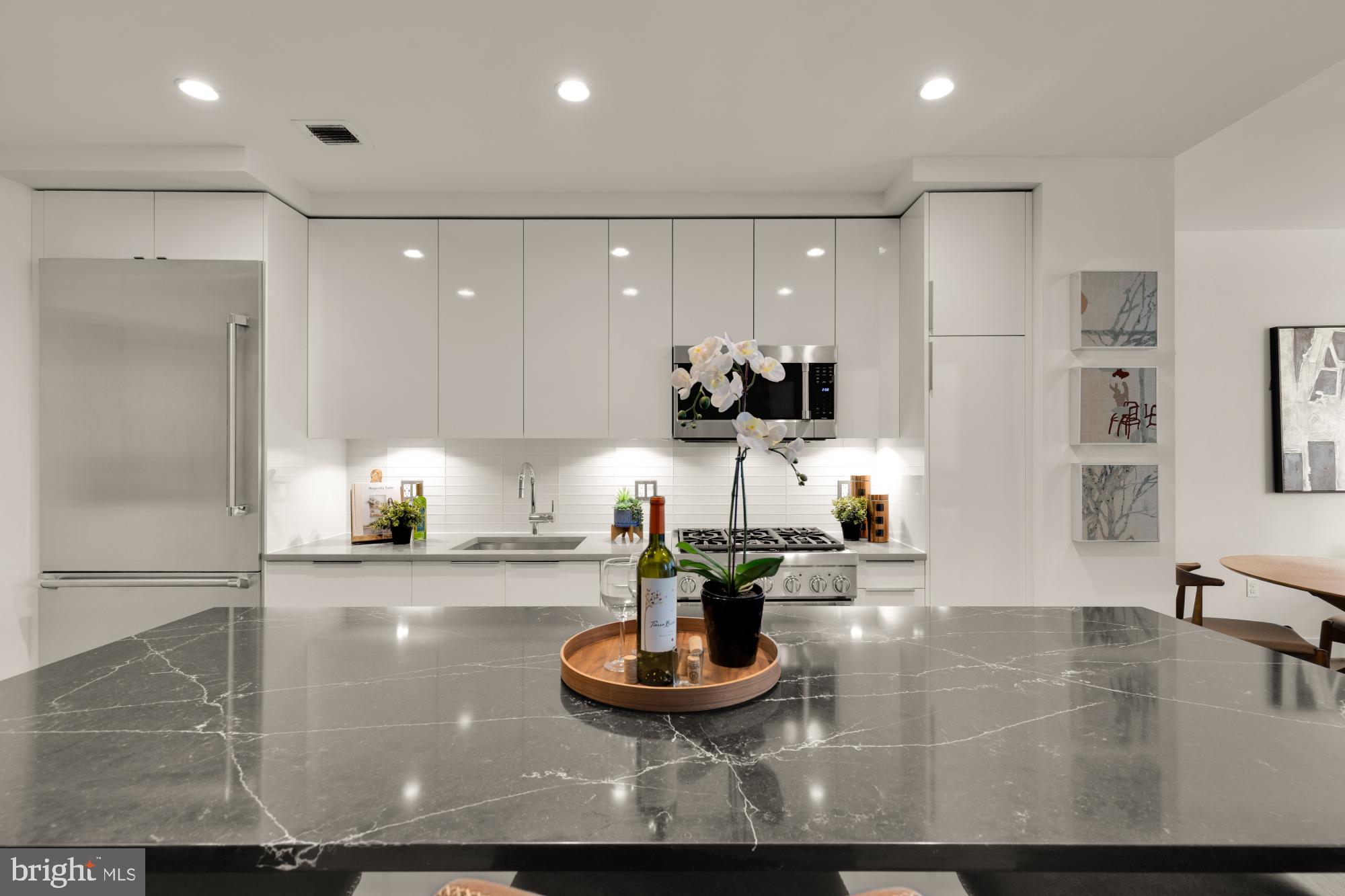 45 Sutton Square Southwest, Unit 303 Washington, DC 20024 - Photo 6 of 60 Kitchen with expanded island for entertaining