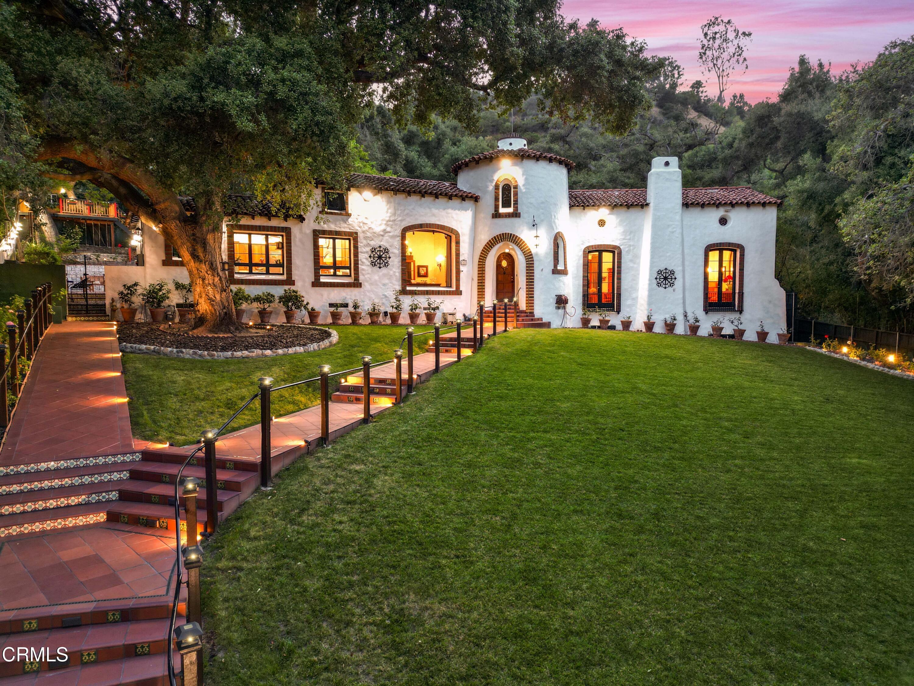 201 La Vereda Road Pasadena, CA 91105 - Photo 1 of 7 a front view of a house with a garden