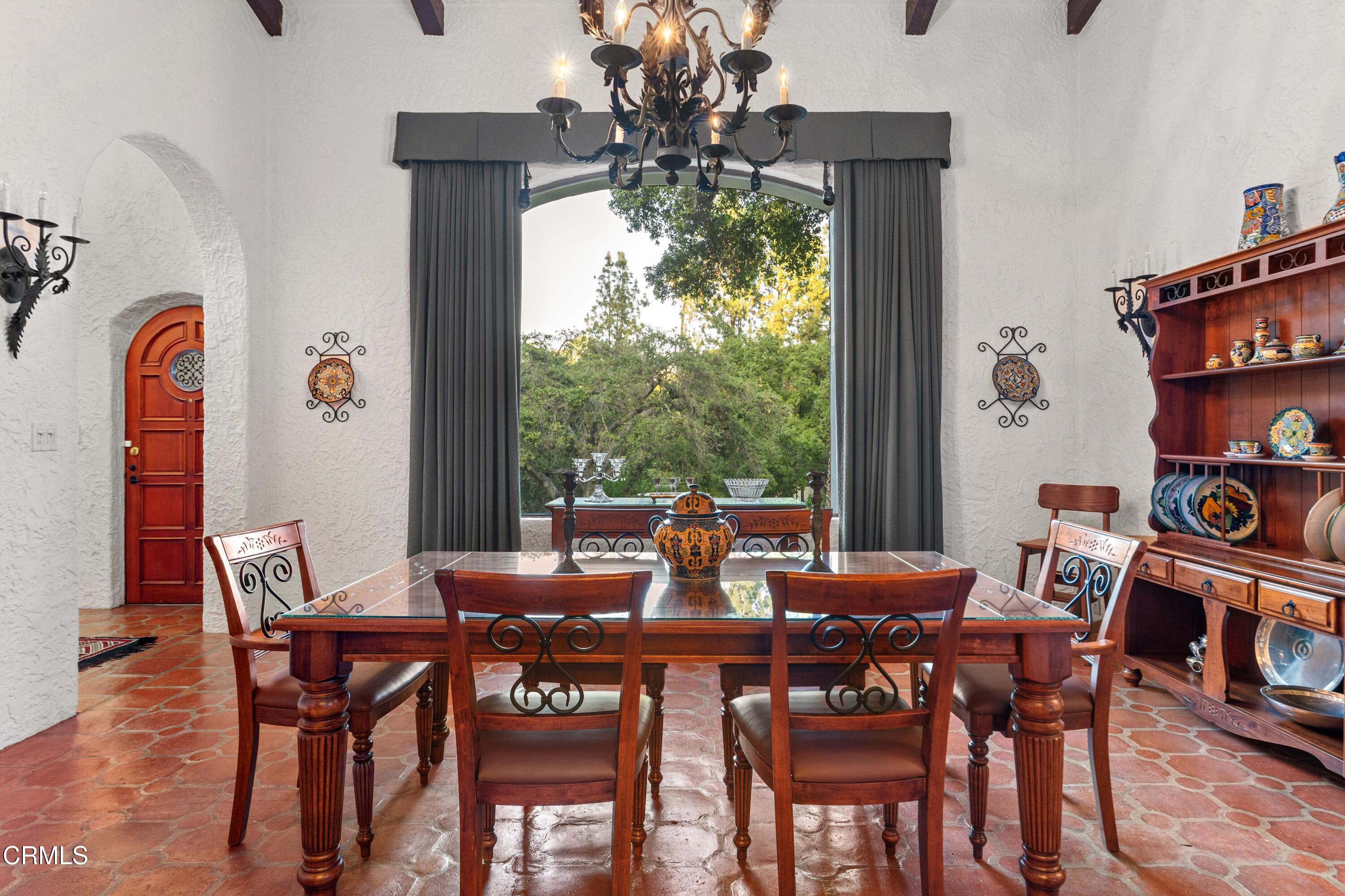 201 La Vereda Road Pasadena, CA 91105 - Photo 3 of 7 a view of a dining room with furniture and chandelier