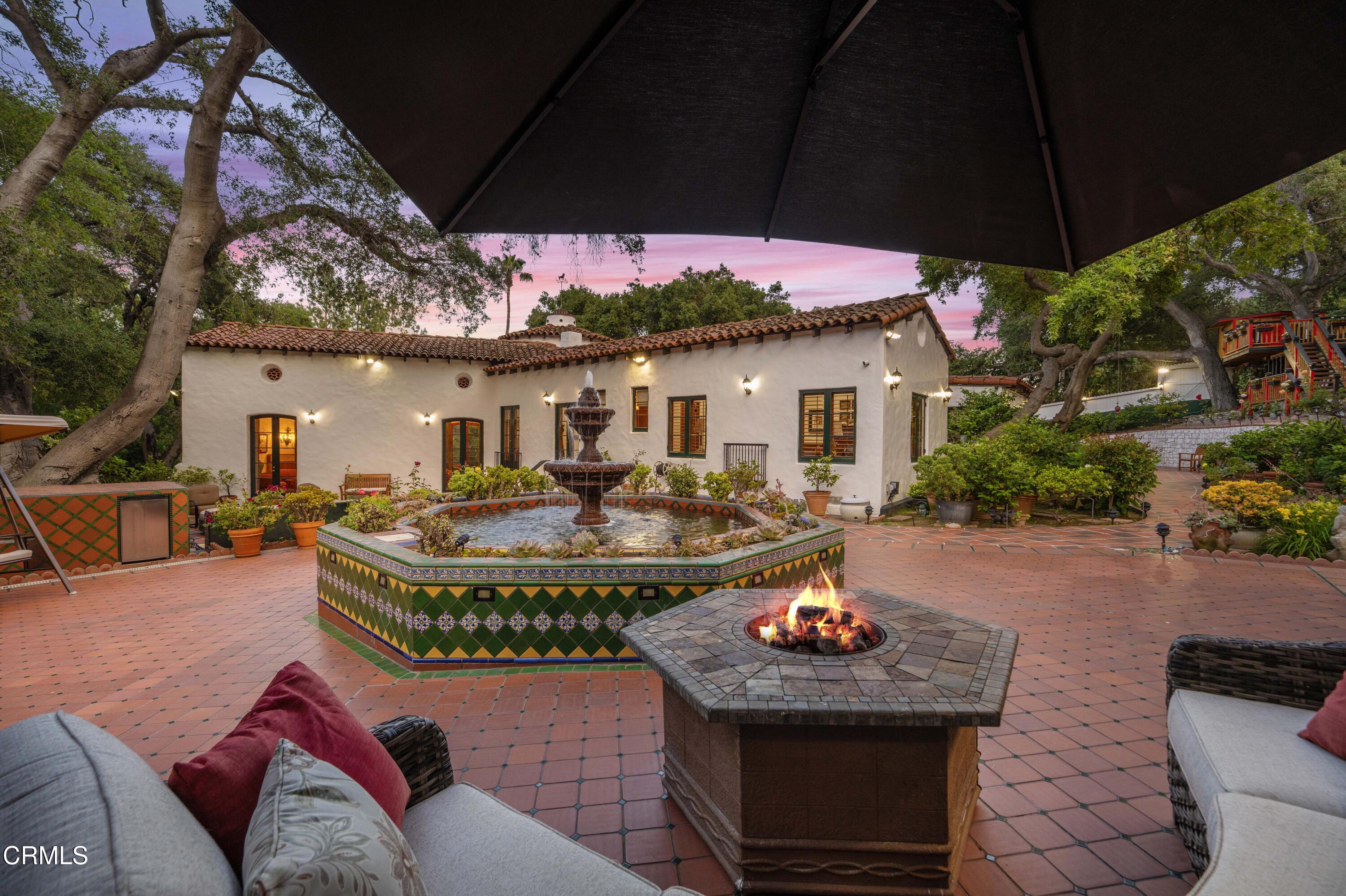 201 La Vereda Road Pasadena, CA 91105 - Photo 7 of 7 a view of a house with backyard and sitting area