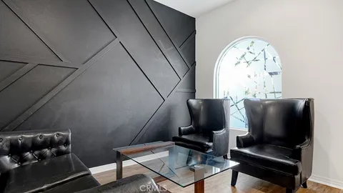 a view of workspace with lounge chair