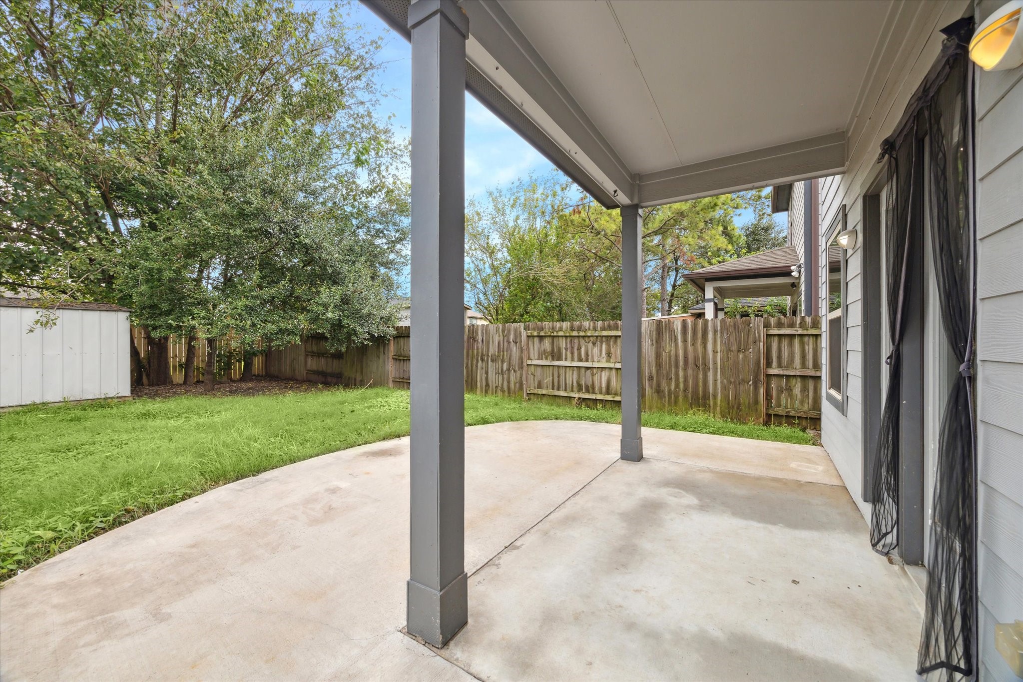 4916 Talina Way Houston, TX 77041 - Photo 17 of 25 a view of a room with porch and garden