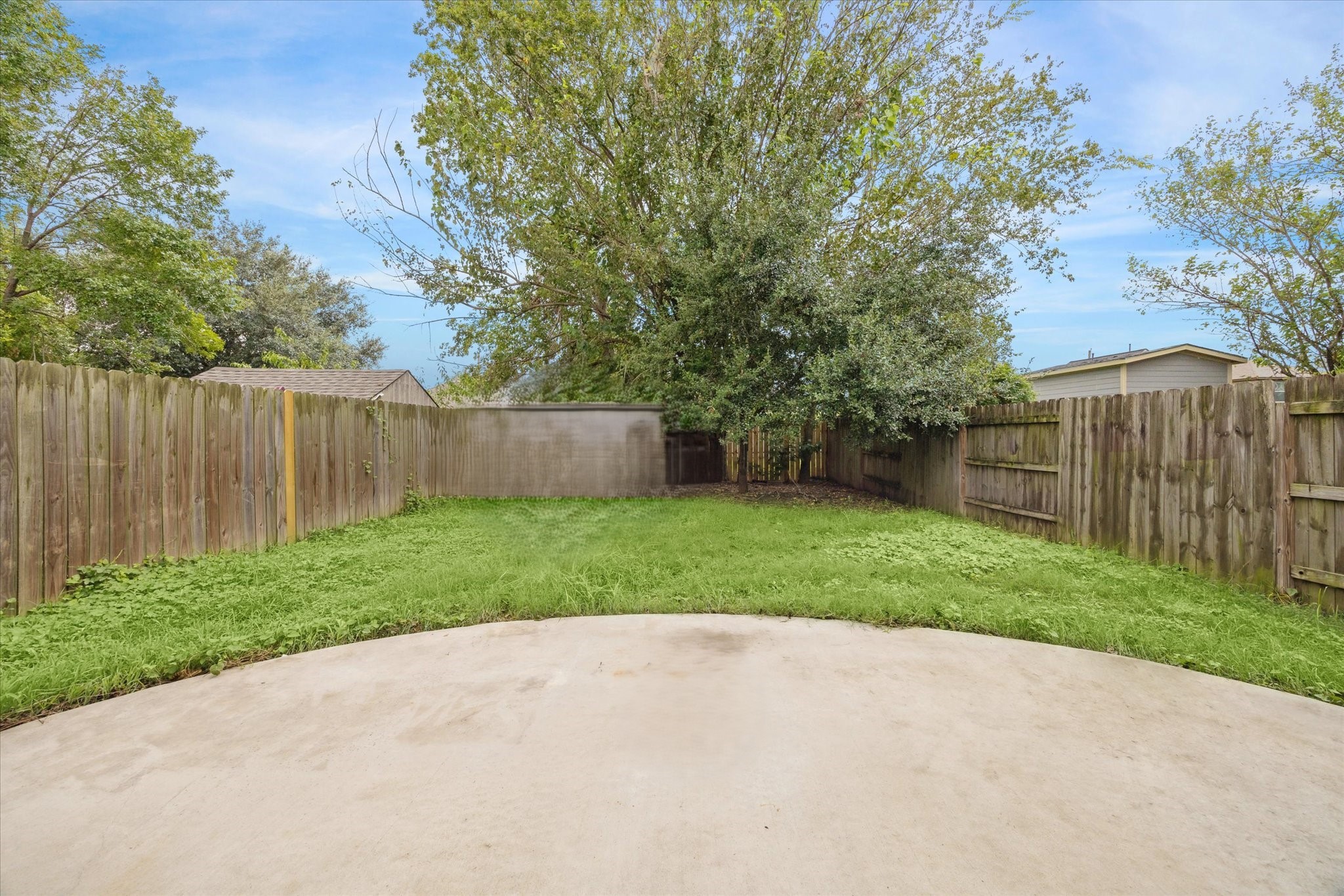 4916 Talina Way Houston, TX 77041 - Photo 20 of 25 a view of a backyard with green space