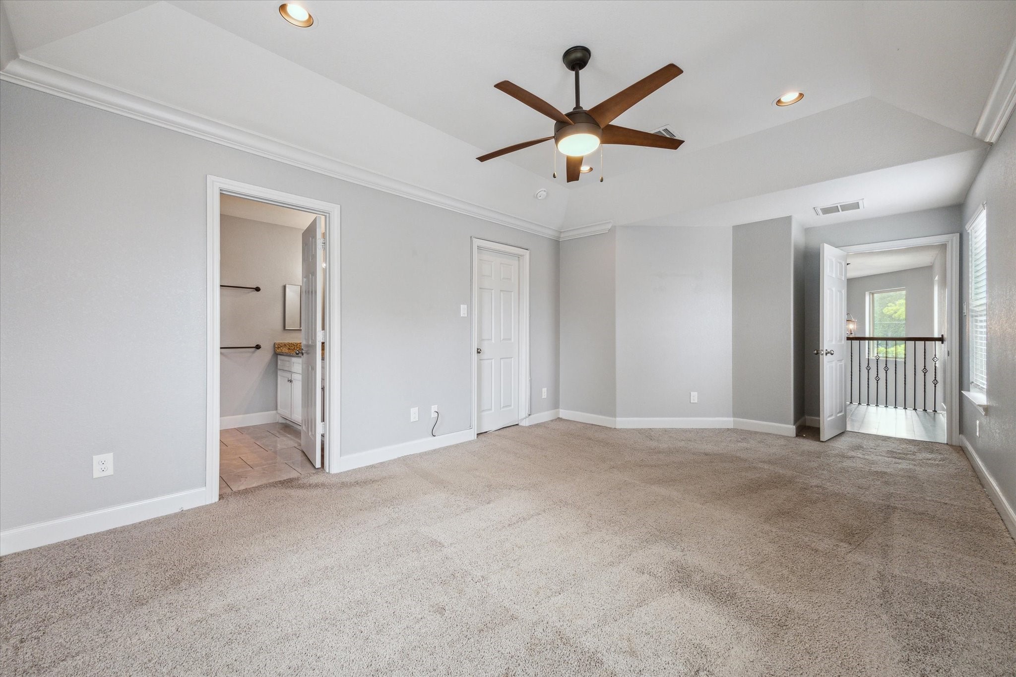4916 Talina Way Houston, TX 77041 - Photo 5 of 25 a view of a livingroom with a ceiling fan and window