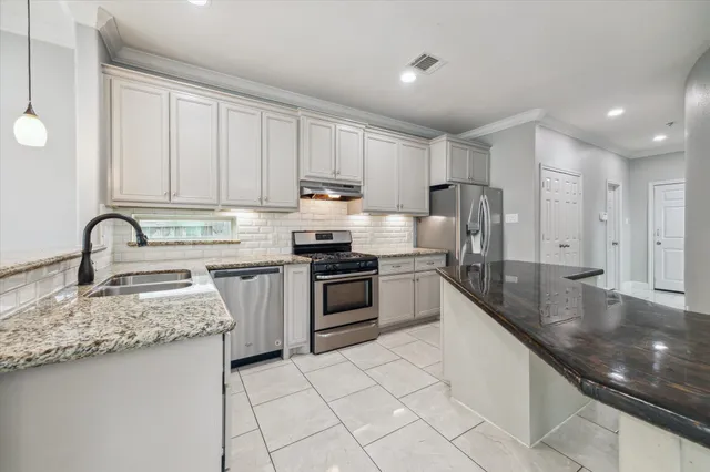 a view of a livingroom with furniture and a chandelier