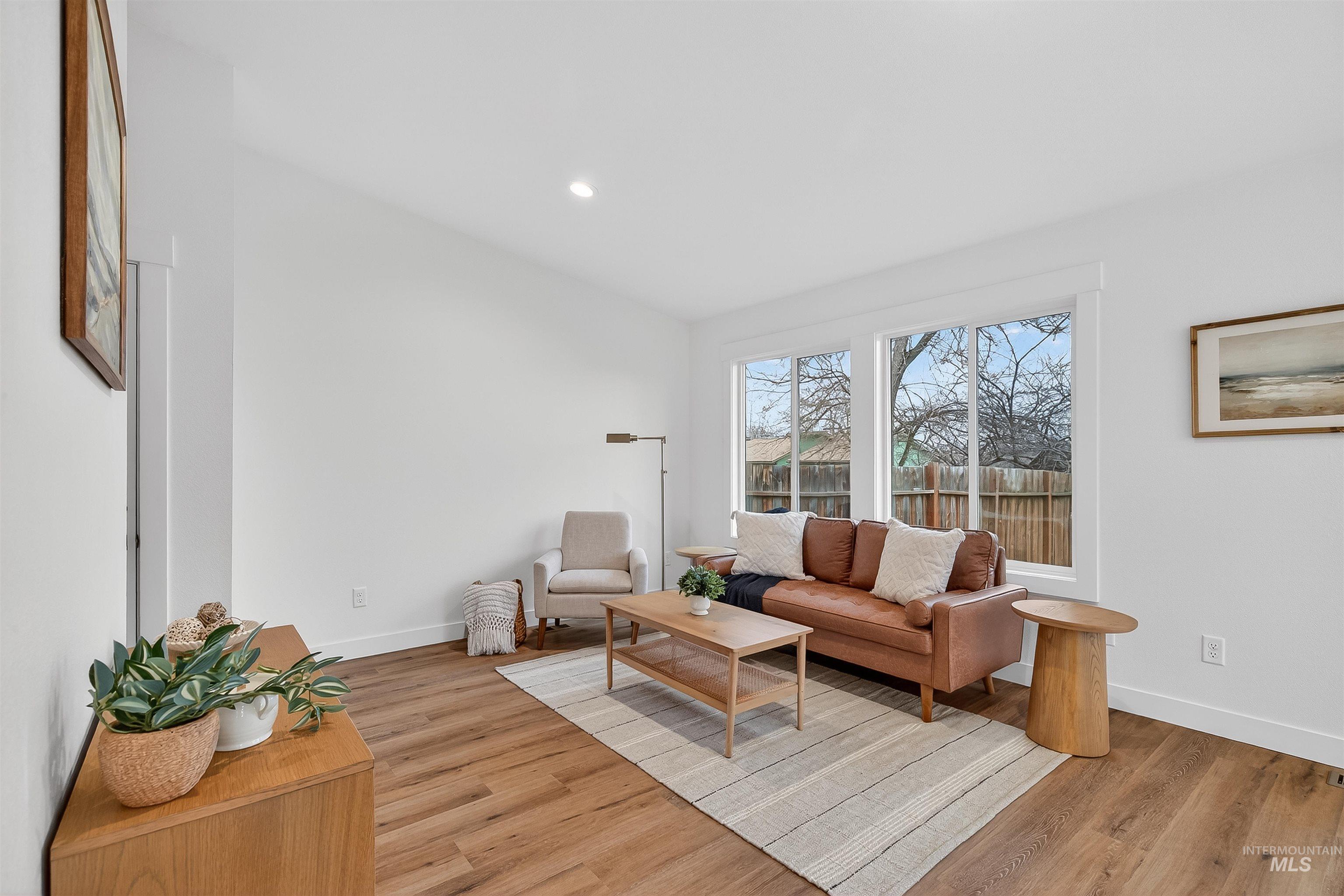 2922 Garfield Court Lewiston, ID 83501 - Photo 14 of 30 Living area with light wood-style floors and recessed lighting