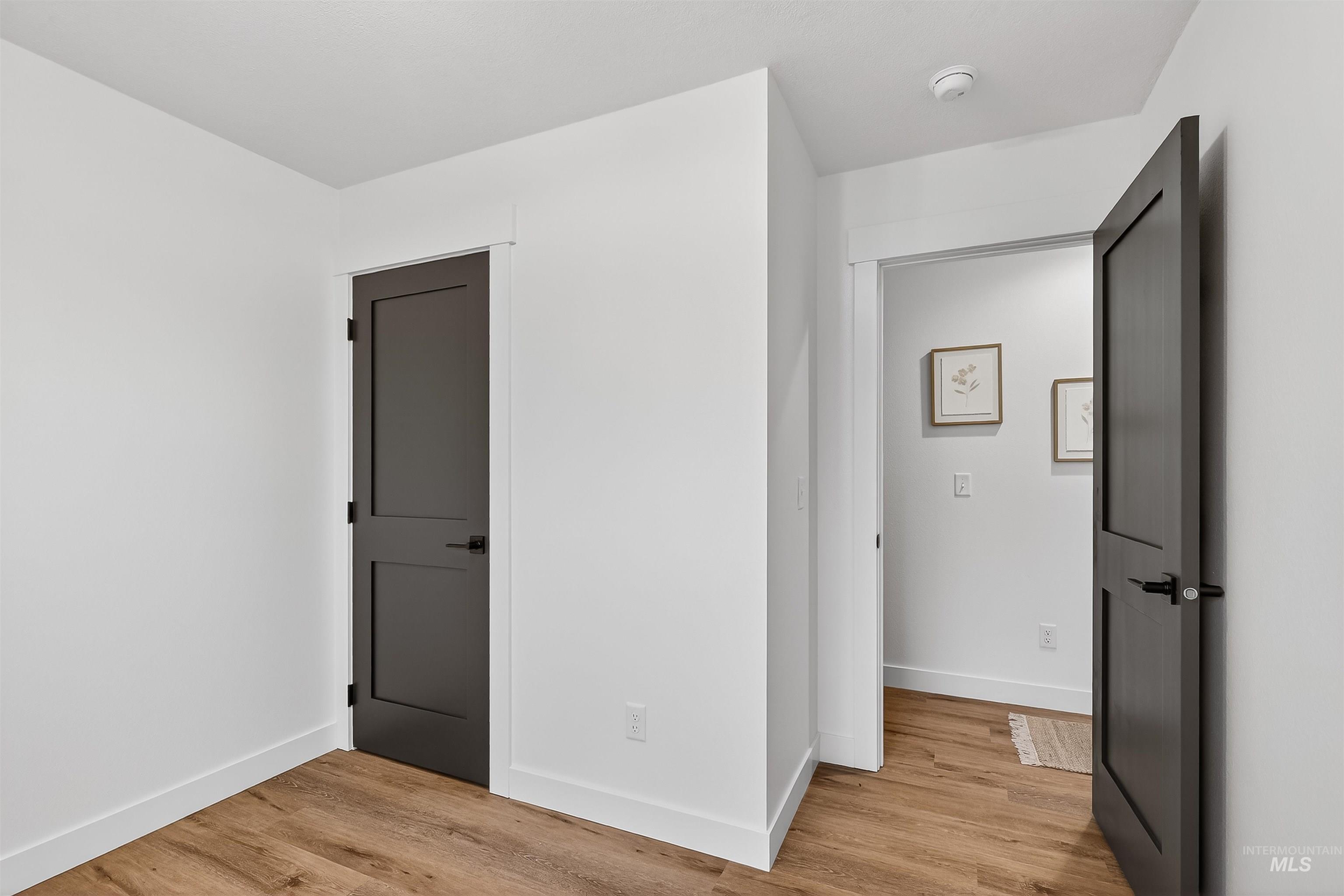 2922 Garfield Court Lewiston, ID 83501 - Photo 23 of 30 Unfurnished bedroom featuring light wood-type flooring and baseboards