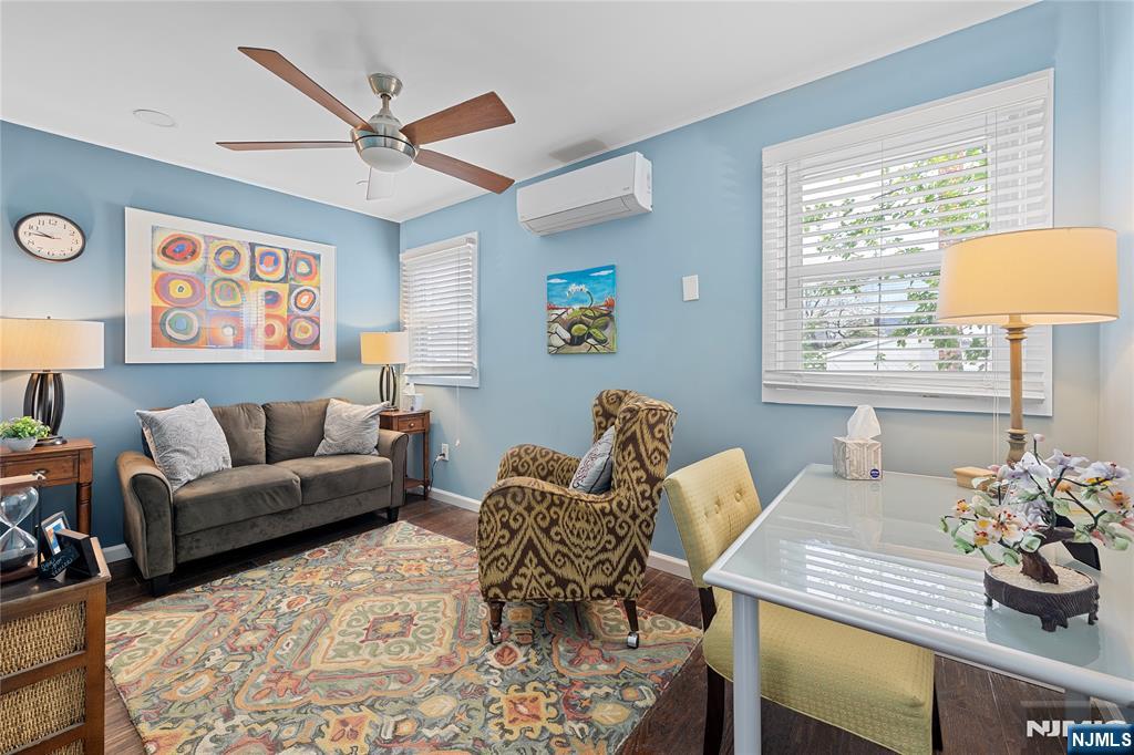 5 Leo Terrace Bloomfield, NJ 07003 - Photo 22 of 32 a living room with furniture and a large window