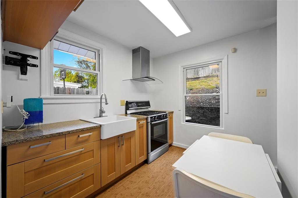 28 Underhill Street Pittsburgh, PA 15205 - Photo 11 of 44 a kitchen with a stove and a sink