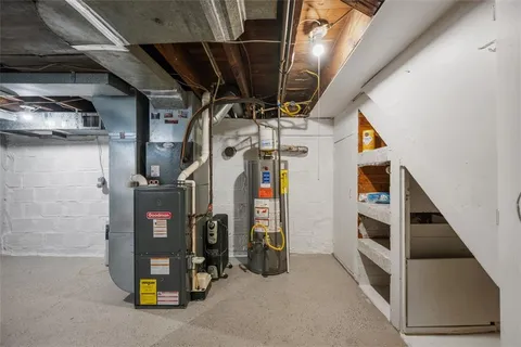 a view of utility and utility room with washer and dryer