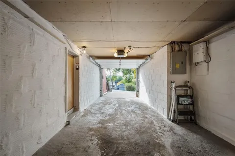 a view of a backyard with chairs