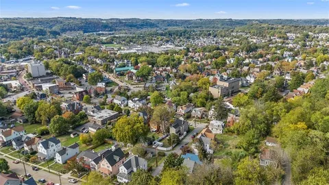 a view of balcony with wooden floor