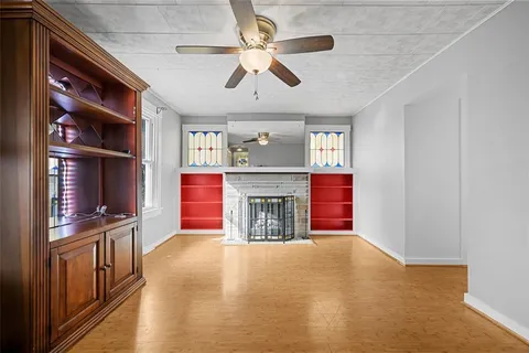 a view of livingroom with furniture and chandelier fan