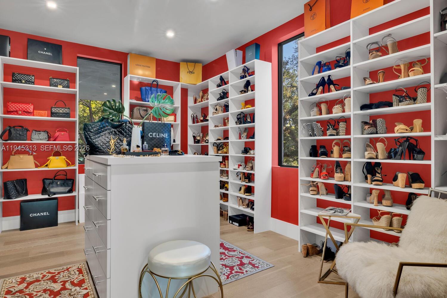 3232 Emathla Street Miami, FL 33133 - Photo 30 of 38 a work place with a bookshelf and a book shelf