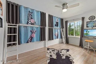 a workspace with furniture hardwood and a window