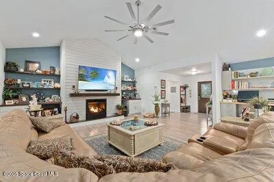 a bedroom with a bed and a couch