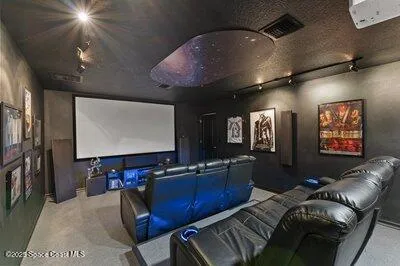 a bedroom with a bed potted plant with the outer view