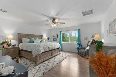 a utility room with cabinets washer and dryer