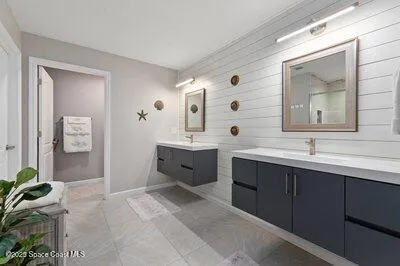 a living room with furniture and garden view