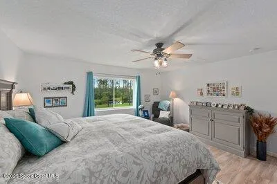 a view of a chairs in a backyard