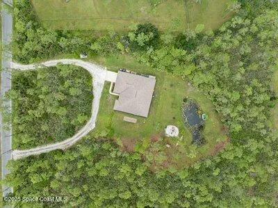 a sign board with a bench in the middle