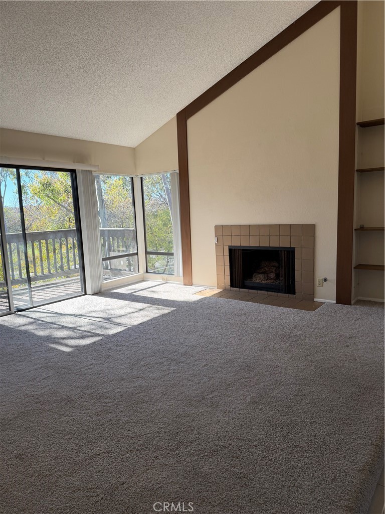 29 Cerrito Irvine, CA 92612 - Photo 9 of 11 a view of empty room with a fireplace