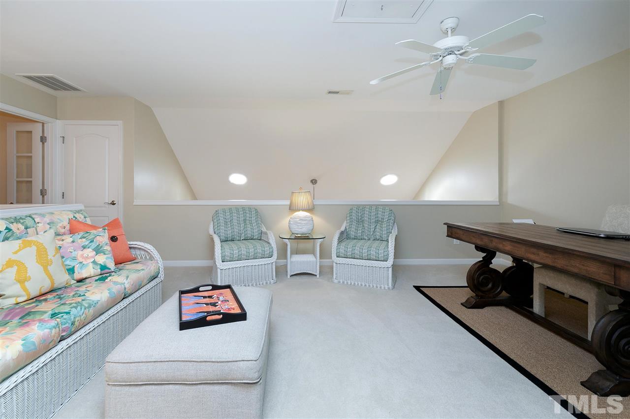 5110 Kate Denson Way Raleigh, NC 27612 - Photo 19 of 30 a living room with furniture and a fireplace