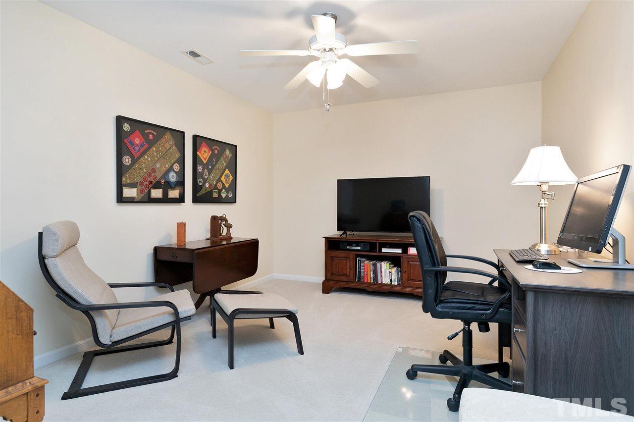 5110 Kate Denson Way Raleigh, NC 27612 - Photo 20 of 30 a view of a livingroom with workspace and a couch