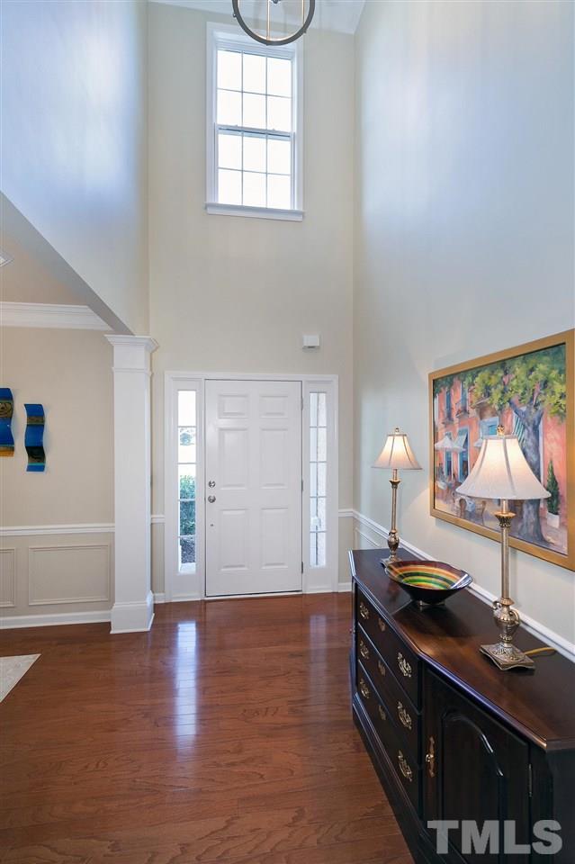 5110 Kate Denson Way Raleigh, NC 27612 - Photo 3 of 30 a living room with furniture and a lamp
