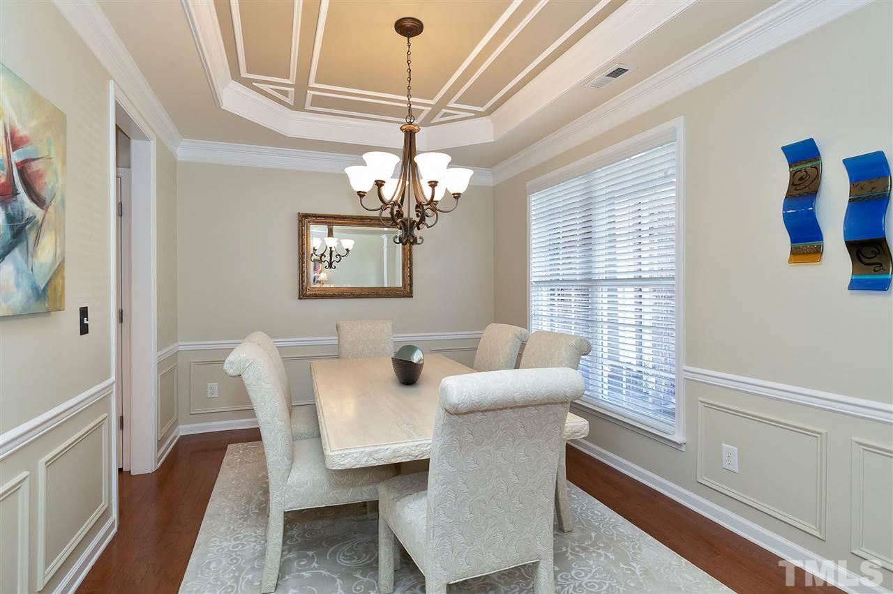 5110 Kate Denson Way Raleigh, NC 27612 - Photo 5 of 30 a view of a dining room with furniture and chandelier