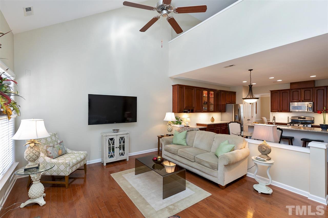 5110 Kate Denson Way Raleigh, NC 27612 - Photo 10 of 30 a living room with furniture and a flat screen tv