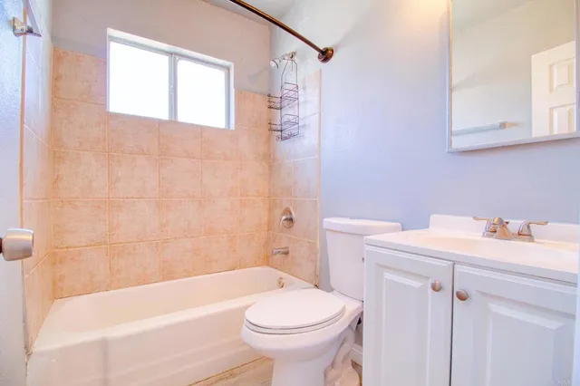 a view of a kitchen from the hallway