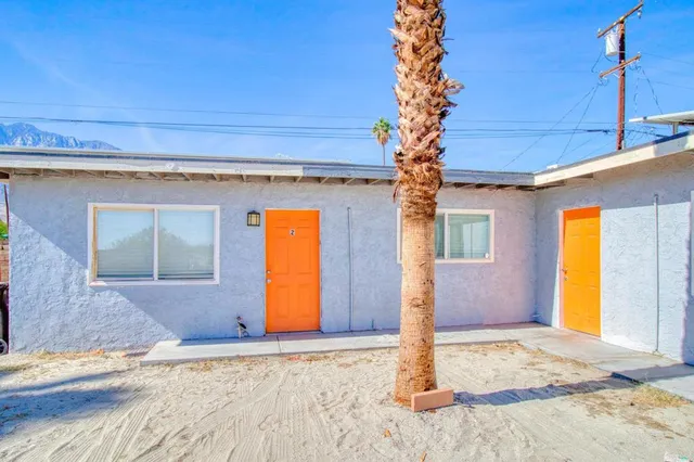 a view of a house with a ocean beach