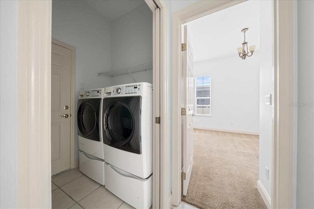 3003 Southwest 41st Place Ocala, FL 34474 - Photo 34 of 65 a utility room with dryer and washer