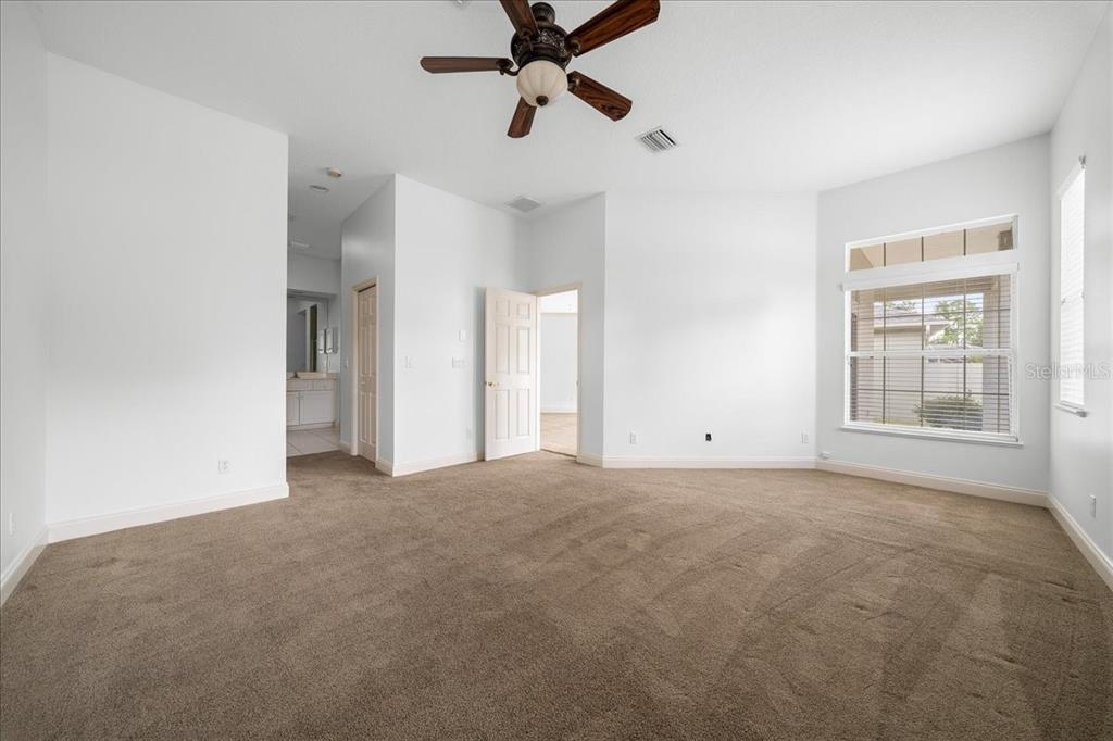 3003 Southwest 41st Place Ocala, FL 34474 - Photo 44 of 65 a view of a livingroom with a ceiling fan and window